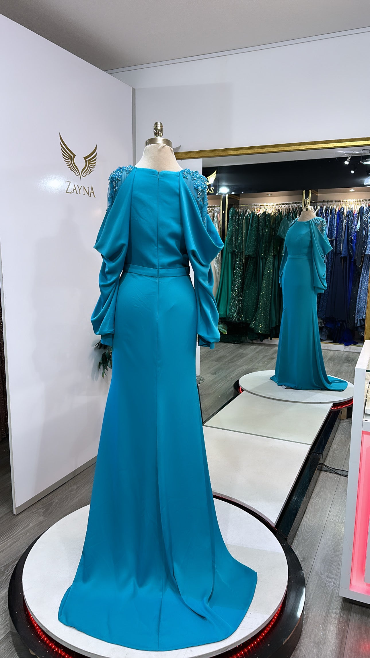 Elegant light blue decorated with beads, slit