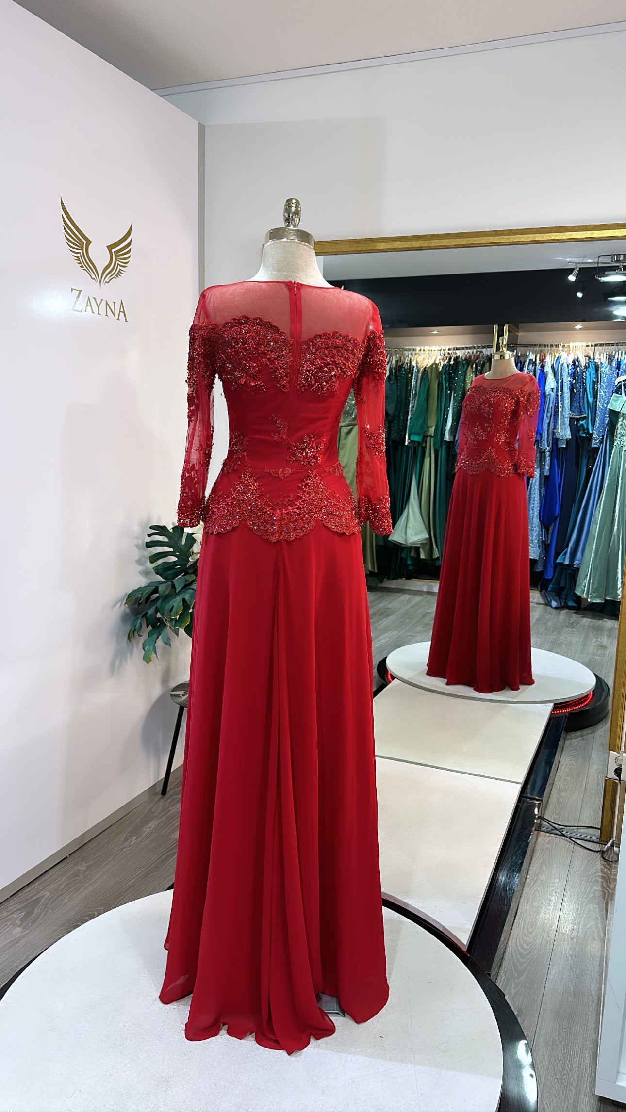 Elegant red dress decorated with beads, headscarf