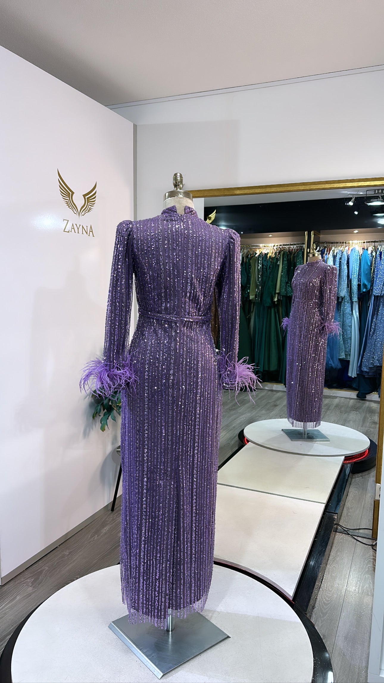 Elegant purple dress with glitter, feathers