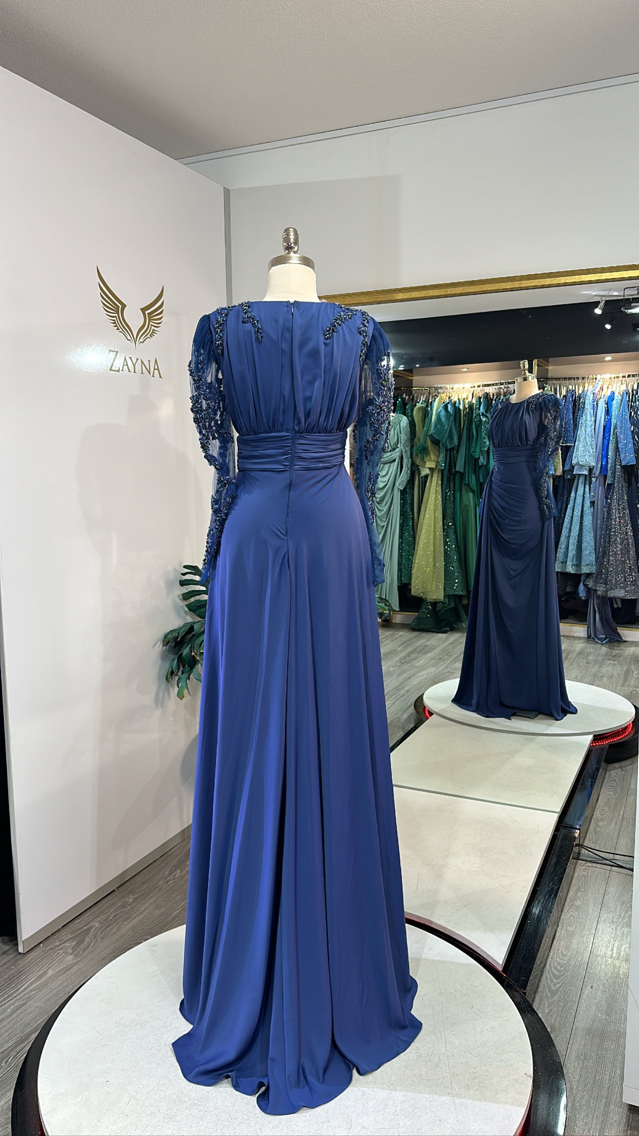 Elegant dark blue dress with beads, split
