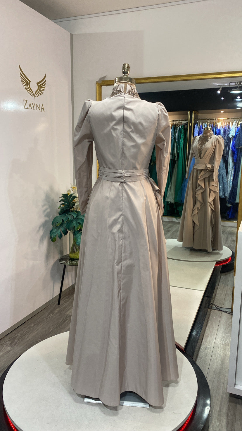 Elegant beige bead-covered dress