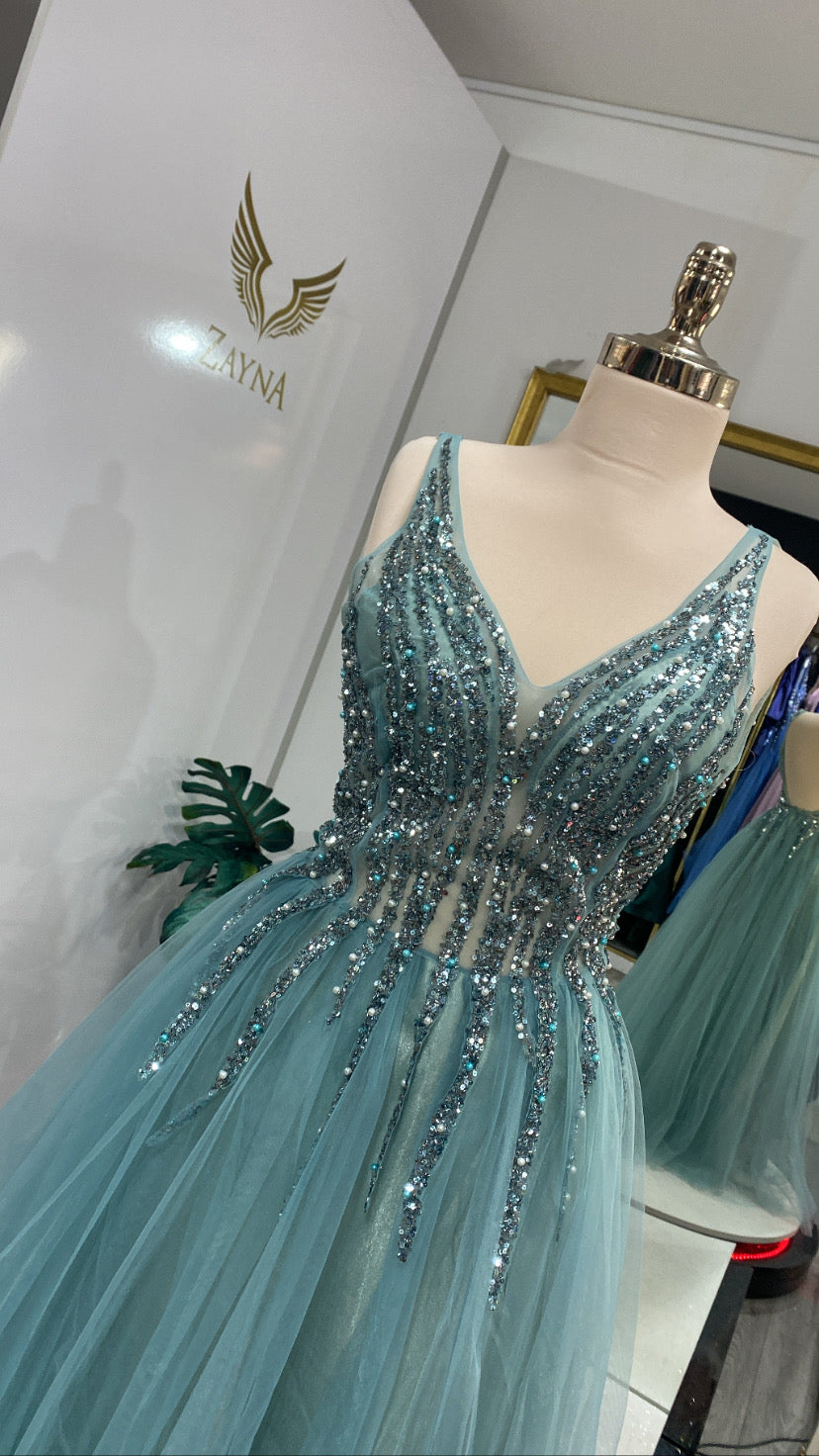 Light green dress decorated with bead