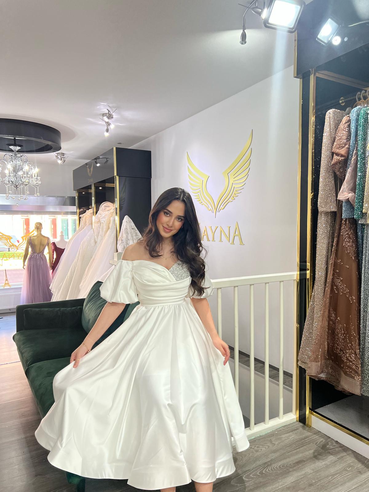 Our beautiful white dress with silver stones