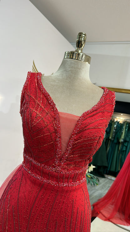 Elegant red dress with train, decorated with beads