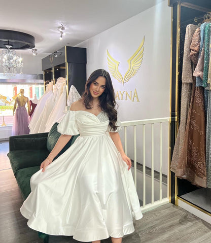 Our beautiful white dress with silver stones