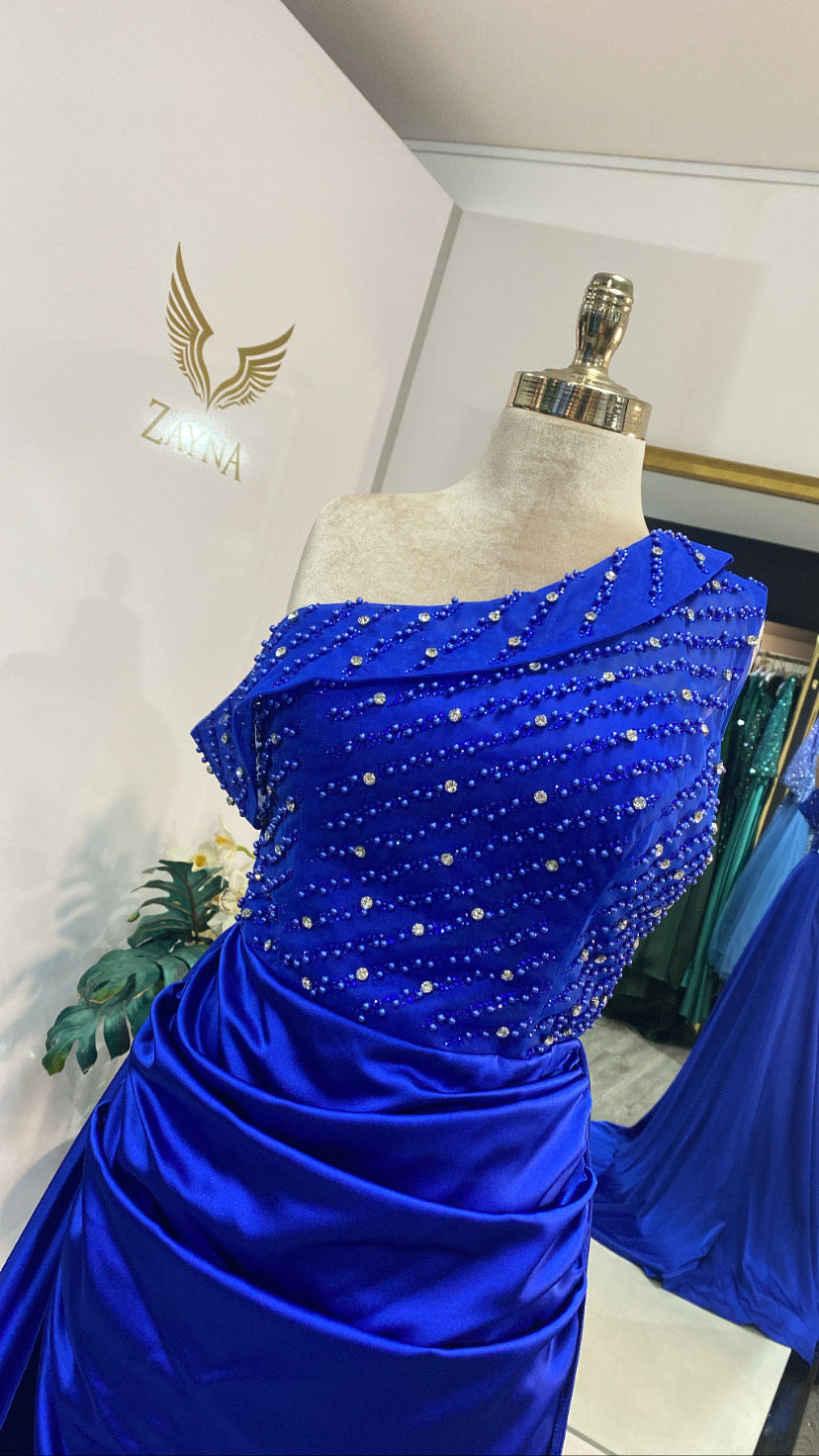 Elegant blue dress decorated with beaded satin