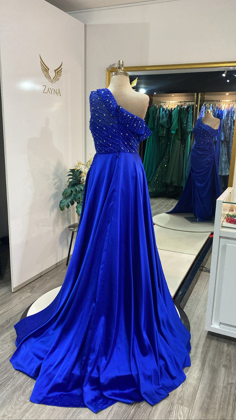 Elegant blue dress decorated with beaded satin